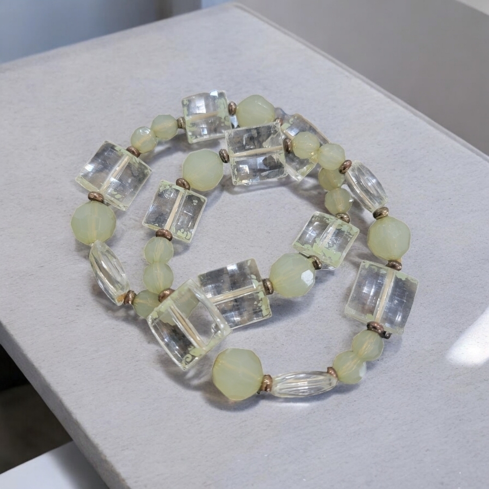 Two green stretch bracelets